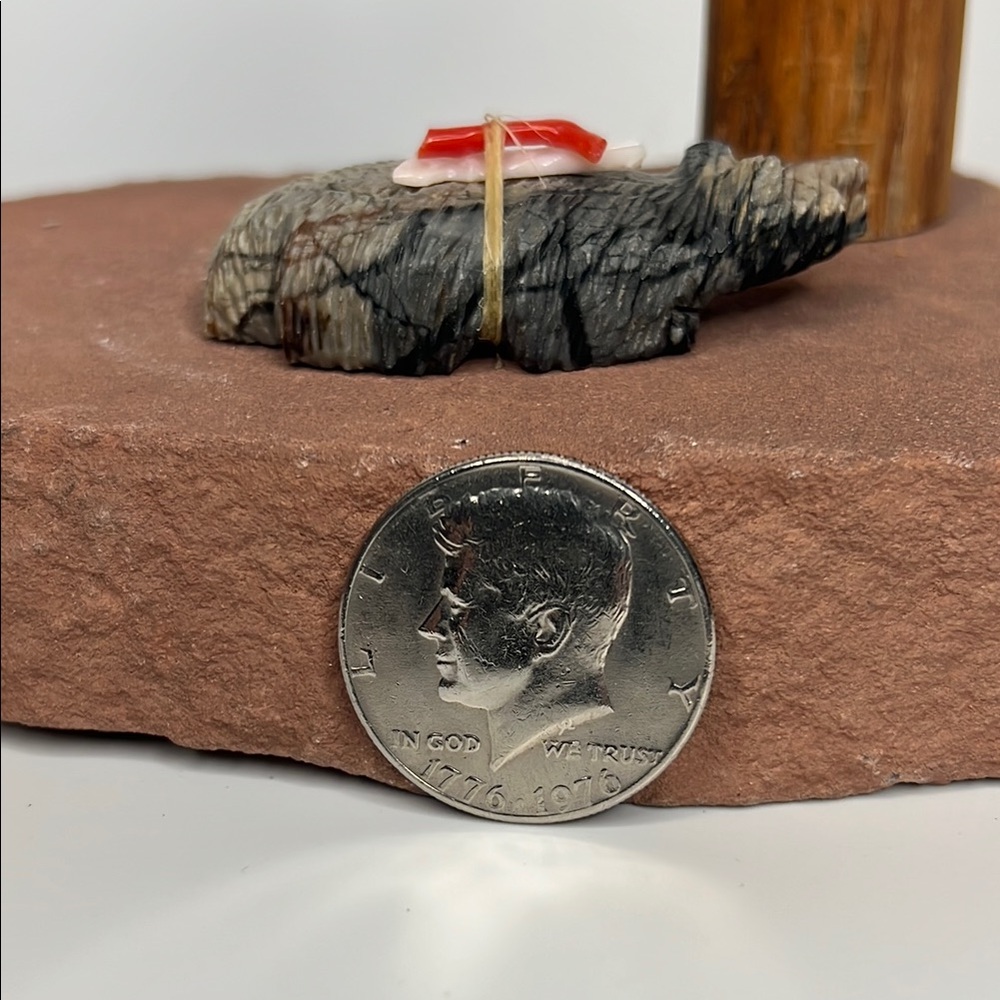 Decorative Picasso Stone Bear accent with Red and Gray Detailing.